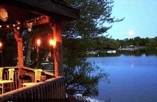 266 Victorian Village Dr Unit 226, Elkhart Lake, WI 53020 - dock with a water view