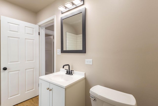 4366 N 25th St, Milwaukee, WI 53209 - bathroom featuring vanity and wood finished floors