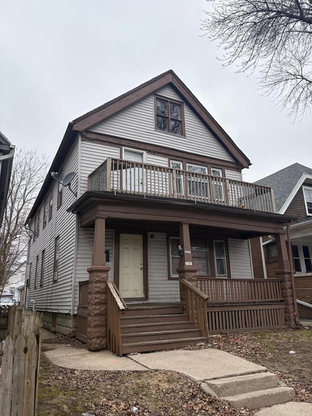 2341 S 12th St, Milwaukee, WI 53215 - view of front facade with covered porch and a balcony