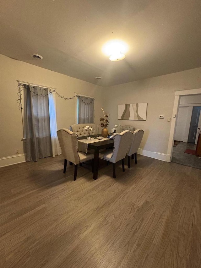 2341 S 12th St, Milwaukee, WI 53215 - dining area featuring wood finished floors and baseboards