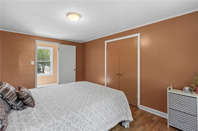 110 1st Ave, Balsam Lake, WI 54005 - bedroom featuring wood finished floors, ornamental molding, and a closet