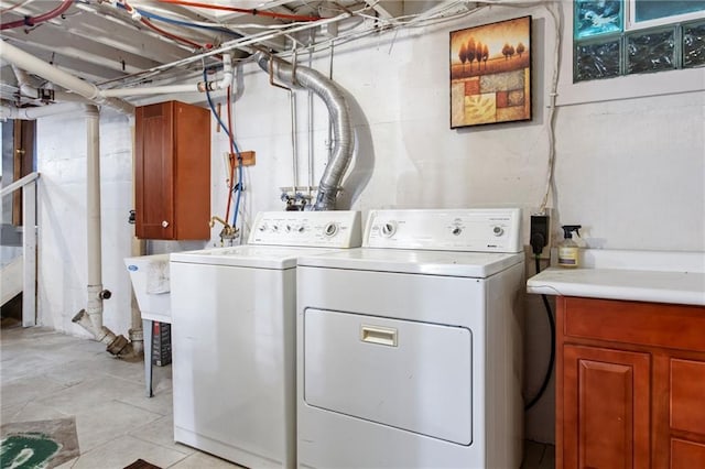 110 1st Ave, Balsam Lake, WI 54005 - laundry room with washing machine and clothes dryer and cabinet space
