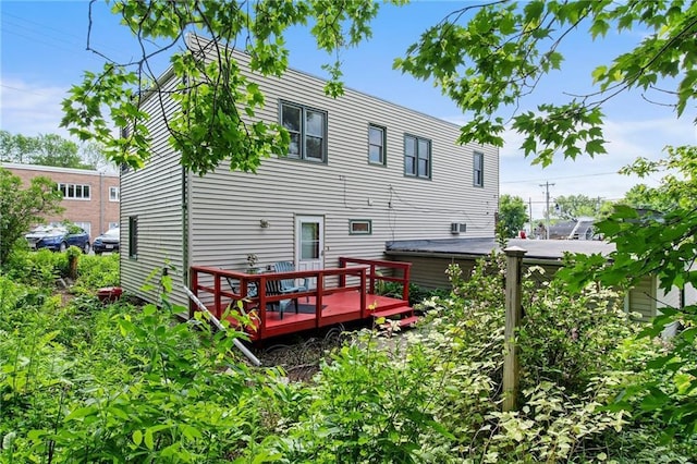110 1st Ave, Balsam Lake, WI 54005 - back of house featuring a wooden deck