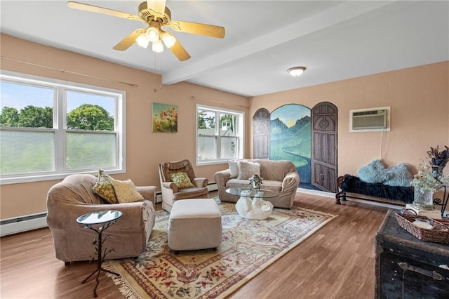 110 1st Ave, Balsam Lake, WI 54005 - living room featuring a wall unit AC, beamed ceiling, wood finished floors, baseboard heating, and a ceiling fan