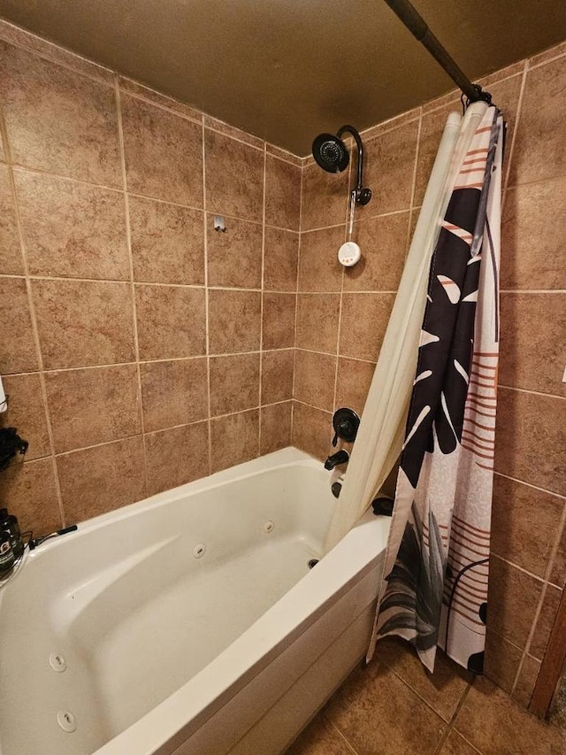 123 Main St, Genoa, WI 54632 - bathroom with a combined bath / shower with jetted tub and tile patterned floors