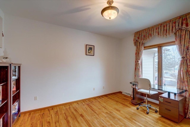 4205 Monarch Ct, Middleton, WI 53562 - home office with light wood finished floors and baseboards