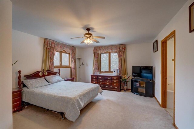 4205 Monarch Ct, Middleton, WI 53562 - bedroom with light colored carpet and ceiling fan