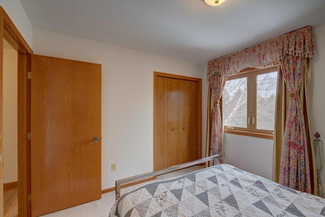 4205 Monarch Ct, Middleton, WI 53562 - carpeted bedroom with a closet and baseboards