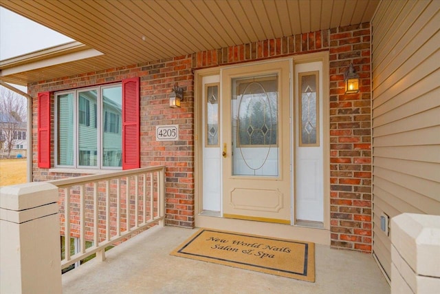 4205 Monarch Ct, Middleton, WI 53562 - property entrance with covered porch and brick siding