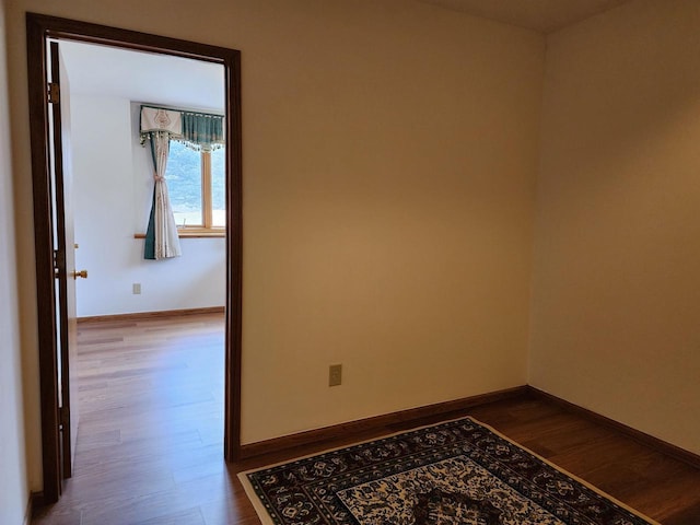 4205 Monarch Ct, Middleton, WI 53562 - empty room with dark wood finished floors