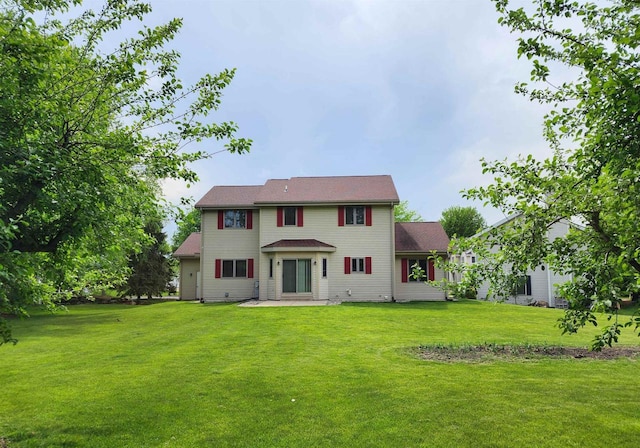 4205 Monarch Ct, Middleton, WI 53562 - rear view of property featuring a lawn and a patio