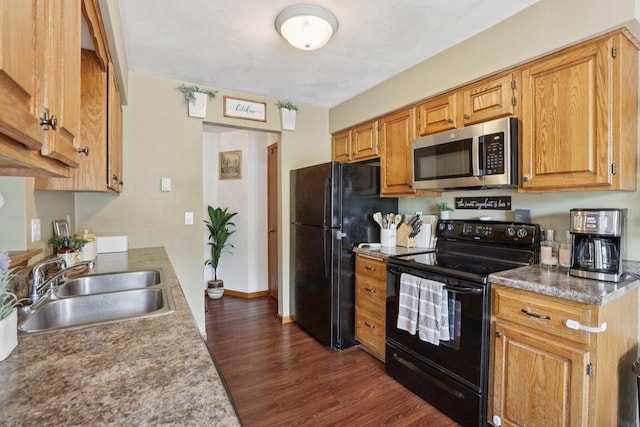 1603 Mckenna Blvd, Madison, WI 53711 - kitchen with black appliances and dark wood-style flooring