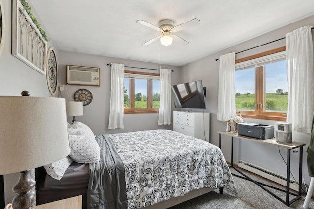 1603 Mckenna Blvd, Madison, WI 53711 - bedroom featuring a baseboard heating unit, multiple windows, a wall unit AC, and a ceiling fan