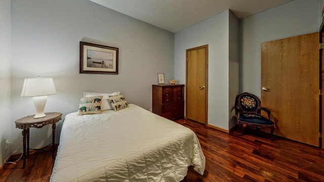 654 Riverview Ct Unit 2-Bldg C, Jefferson, WI 53549 - bedroom with dark wood-style flooring