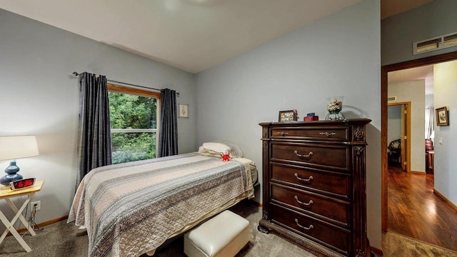 654 Riverview Ct Unit 2-Bldg C, Jefferson, WI 53549 - bedroom featuring baseboards and dark wood-type flooring