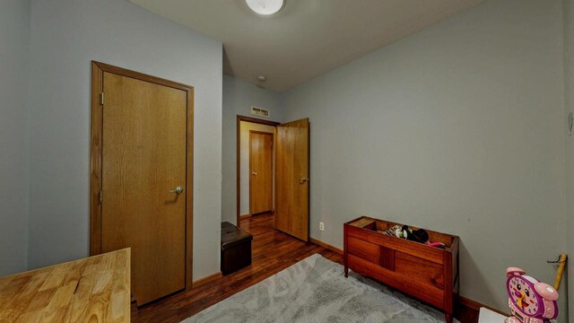 654 Riverview Ct Unit 2-Bldg C, Jefferson, WI 53549 - bedroom with wood finished floors and baseboards