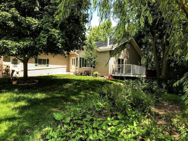654 Riverview Ct Unit 2-Bldg C, Jefferson, WI 53549 - rear view of property with a yard and a deck