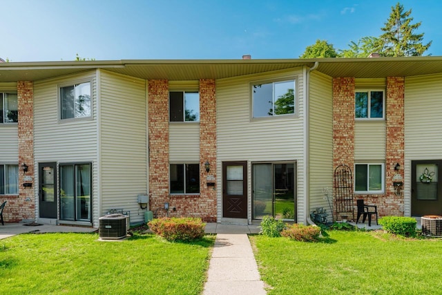 W169N11492 Biscayne Dr, Germantown, WI 53022 - view of front of house featuring a front yard and brick siding