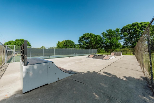 W169N11492 Biscayne Dr, Germantown, WI 53022 - view of home's community featuring a gate and a tennis court