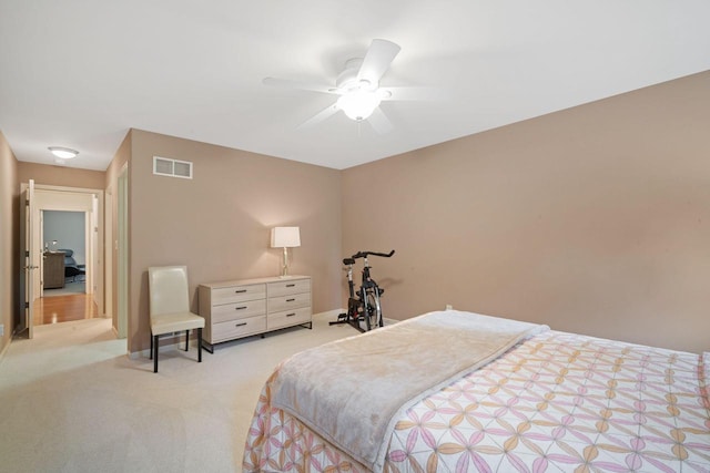 N52W35297 Lighthouse Ln, Oconomowoc, WI 53066 - bedroom with light carpet and a ceiling fan
