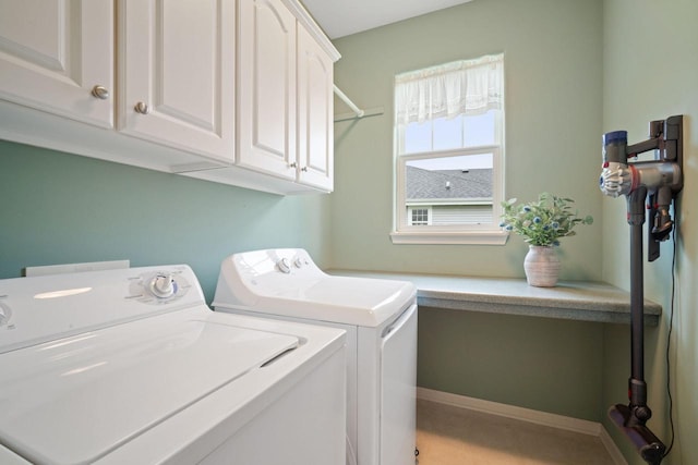 N52W35297 Lighthouse Ln, Oconomowoc, WI 53066 - laundry room with washer and clothes dryer and cabinet space
