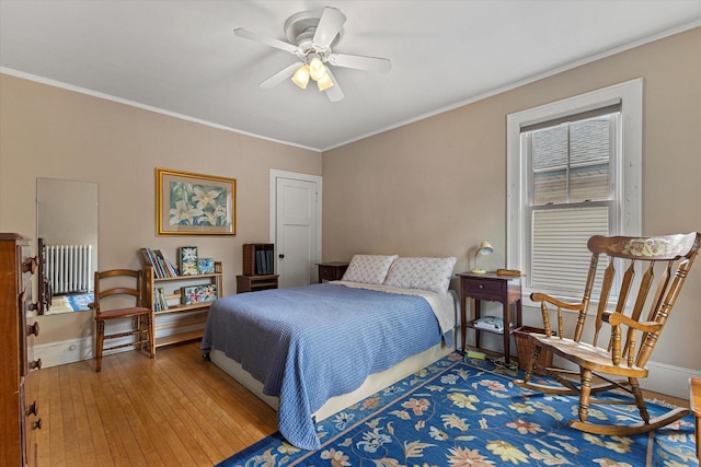4069 N Prospect Ave, Shorewood, WI 53211 - bedroom featuring crown molding, wood-type flooring, and a ceiling fan