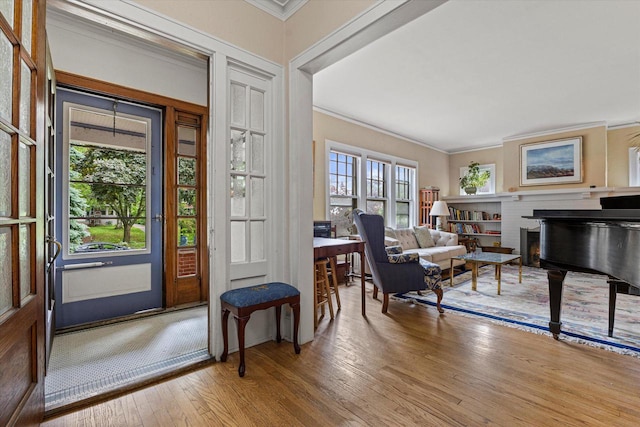 4069 N Prospect Ave, Shorewood, WI 53211 - entrance foyer featuring crown molding and wood finished floors