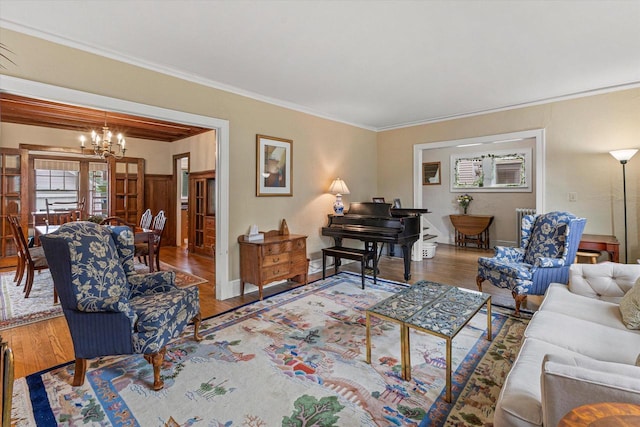 4069 N Prospect Ave, Shorewood, WI 53211 - living room with a chandelier, crown molding, and wood finished floors