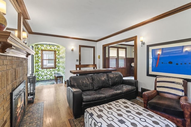 1853 N 83rd St, Wauwatosa, WI 53213 - living room featuring a fireplace, hardwood / wood-style floors, and ornamental molding