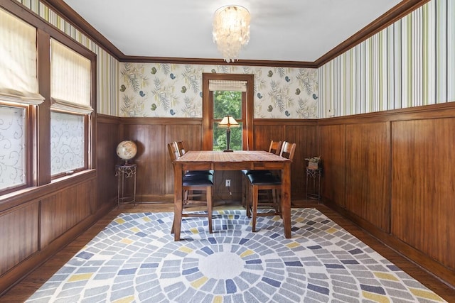1853 N 83rd St, Wauwatosa, WI 53213 - dining space featuring a wainscoted wall, ornamental molding, a chandelier, and wood finished floors