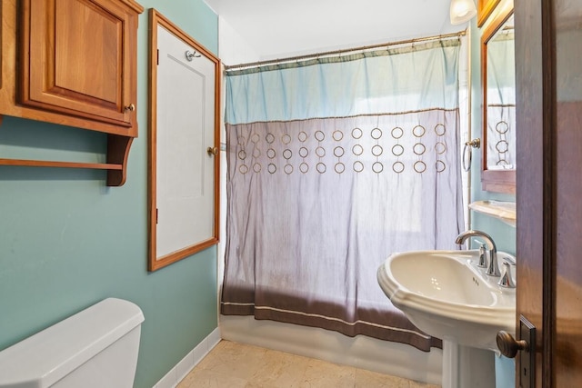 1853 N 83rd St, Wauwatosa, WI 53213 - full bathroom with shower / bath combo with shower curtain and tile patterned floors