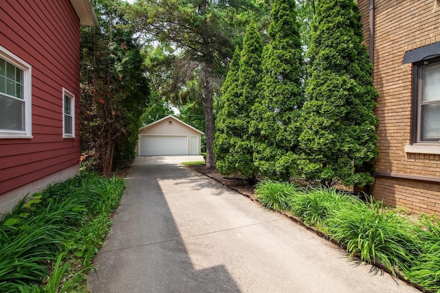 1853 N 83rd St, Wauwatosa, WI 53213 - view of yard with a detached garage and an outbuilding