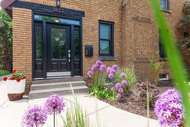 1853 N 83rd St, Wauwatosa, WI 53213 - view of exterior entry with brick siding