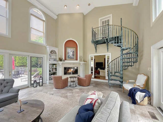 2307 W Willow Creek Ln, Sheboygan, WI 53083 - living area with high vaulted ceiling, stairway, and a glass covered fireplace