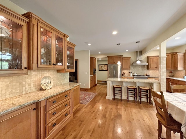 2307 W Willow Creek Ln, Sheboygan, WI 53083 - dining room featuring light wood-style floors and recessed lighting