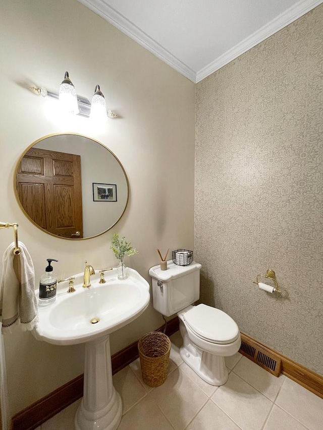 2307 W Willow Creek Ln, Sheboygan, WI 53083 - half bathroom with ornamental molding and tile patterned floors