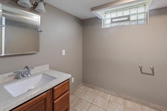 4467 S Nicholson Ave, Saint Francis, WI 53235 - bathroom with vanity and tile patterned floors