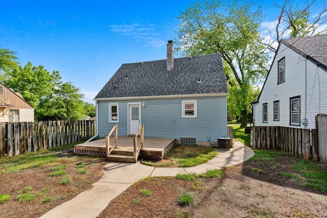 4467 S Nicholson Ave, Saint Francis, WI 53235 - rear view of house with a wooden deck, a chimney, and roof with shingles