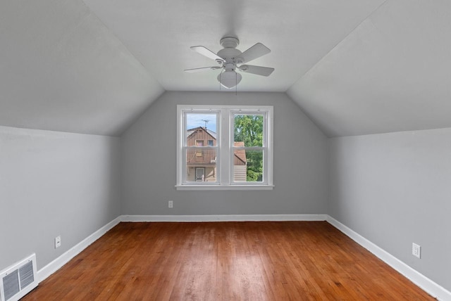 4467 S Nicholson Ave, Saint Francis, WI 53235 - additional living space with a ceiling fan, wood finished floors, and lofted ceiling