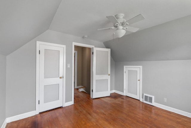 4467 S Nicholson Ave, Saint Francis, WI 53235 - additional living space with lofted ceiling, a ceiling fan, and wood finished floors