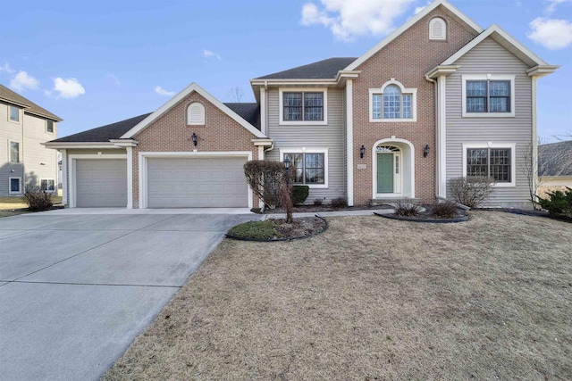 4227 Savannah Ct, Middleton, WI 53562 - view of front of house with a garage, driveway, brick siding, and a front yard