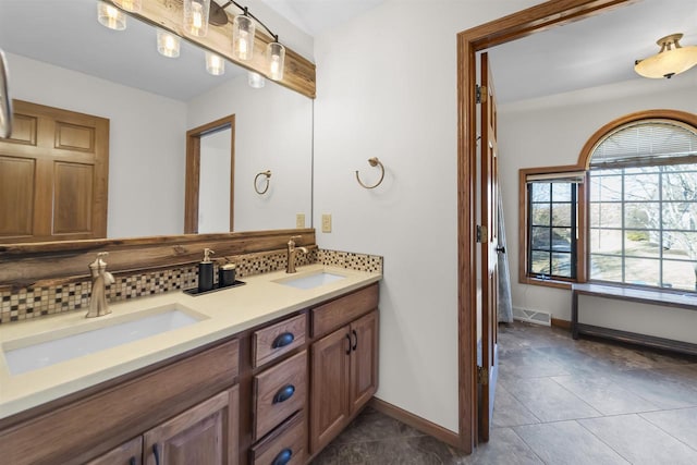 4227 Savannah Ct, Middleton, WI 53562 - full bathroom featuring backsplash, double vanity, and tile patterned flooring