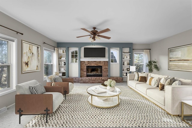 4227 Savannah Ct, Middleton, WI 53562 - carpeted living area with a fireplace and ceiling fan