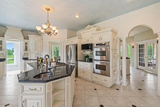 1626 Fox Hollow Ln, Cedarburg, WI 53012 - kitchen with appliances with stainless steel finishes, light tile patterned flooring, plenty of natural light, and recessed lighting