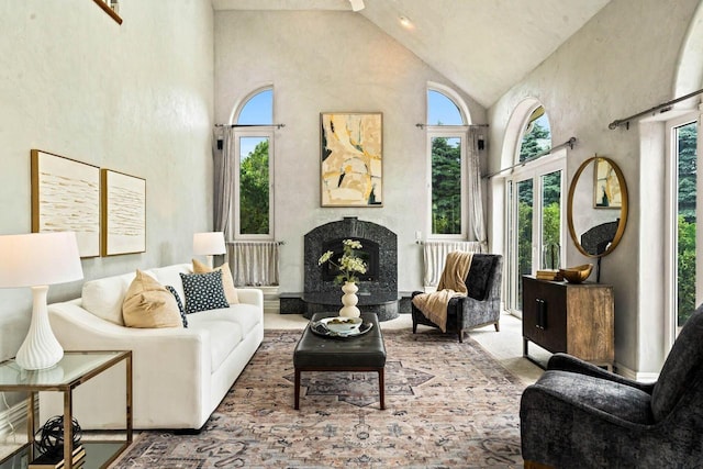 1626 Fox Hollow Ln, Cedarburg, WI 53012 - living area with high vaulted ceiling and a fireplace with raised hearth