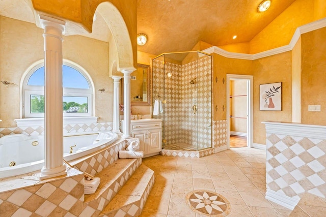 1626 Fox Hollow Ln, Cedarburg, WI 53012 - bathroom with decorative columns, a shower stall, a whirlpool tub, vanity, and vaulted ceiling