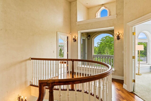 1626 Fox Hollow Ln, Cedarburg, WI 53012 - entrance foyer featuring plenty of natural light, a towering ceiling, and wood finished floors