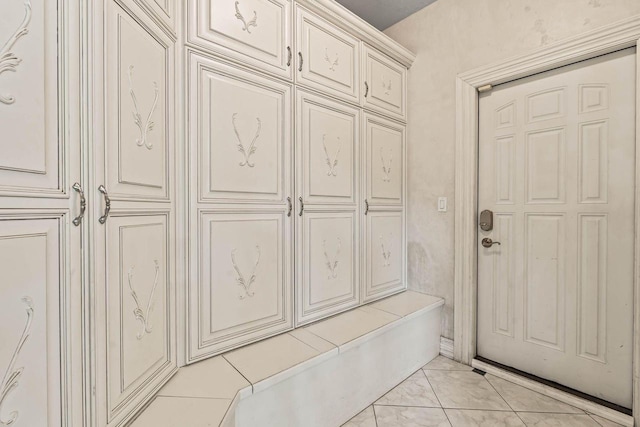 1626 Fox Hollow Ln, Cedarburg, WI 53012 - mudroom featuring light marble finish flooring