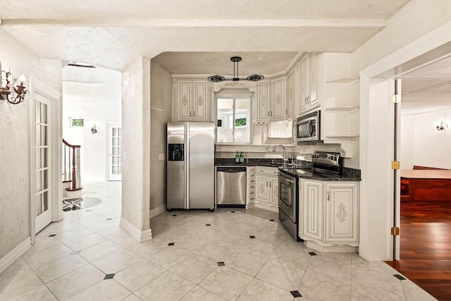 1626 Fox Hollow Ln, Cedarburg, WI 53012 - kitchen with appliances with stainless steel finishes, open shelves, decorative light fixtures, and dark stone countertops