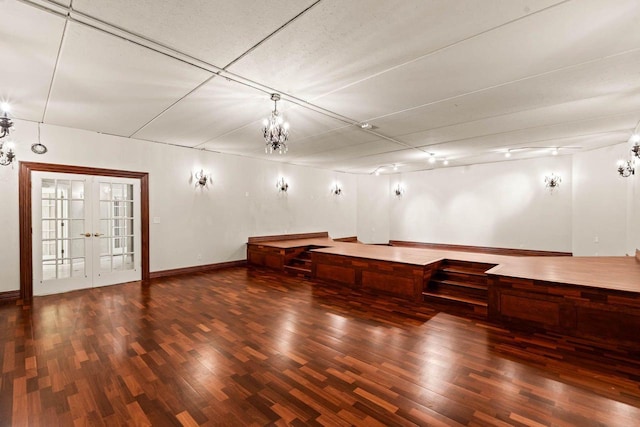 1626 Fox Hollow Ln, Cedarburg, WI 53012 - spare room with wood finished floors, a chandelier, and french doors